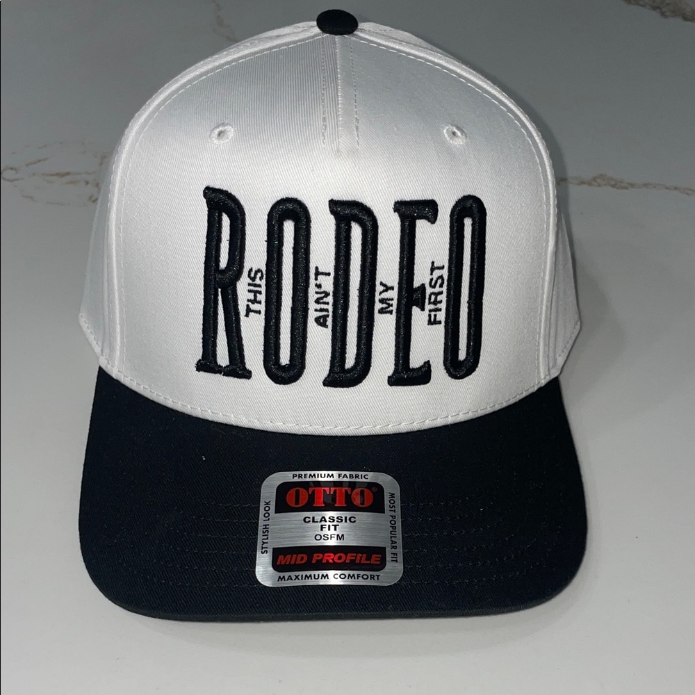 THIS AIN’T MY FIRST RODEO Black and White Classic Fit Hat